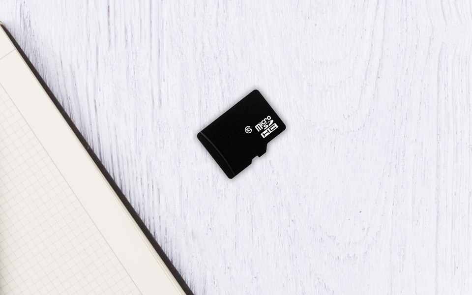black MicroSD card on desk